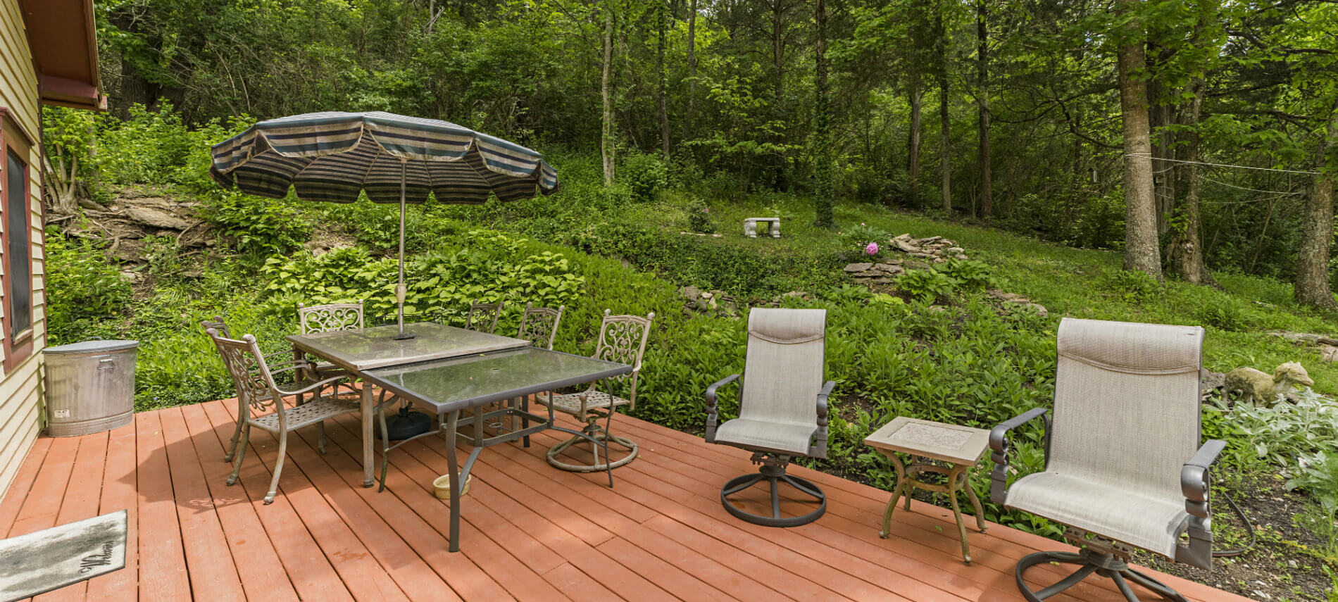 The red-stained deck is a wonderful place in the morning and evening with cool breezes coming out of the hillside.